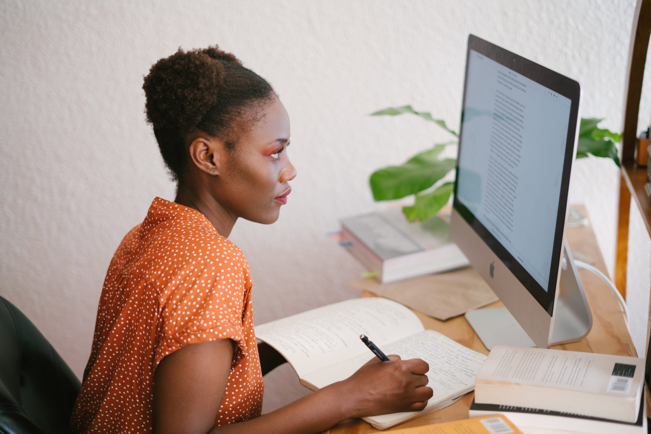 Woman writing notes