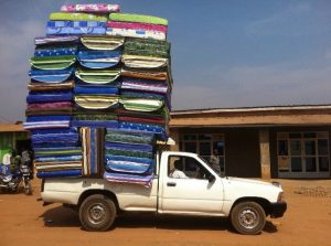 Ute crammed with mattresses